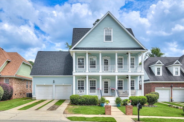 210 Oleander Trl, Evans, GA 30809 - greek revival inspired property with a ceiling fan, a porch, driveway, a front yard, and a balcony
