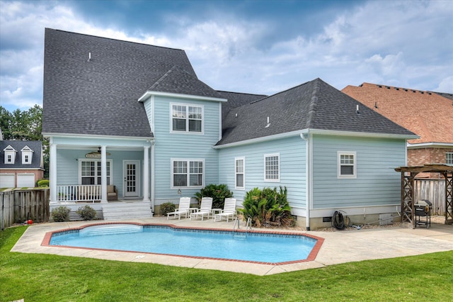 210 Oleander Trl, Evans, GA 30809 - back of property featuring a patio area and a shingled roof
