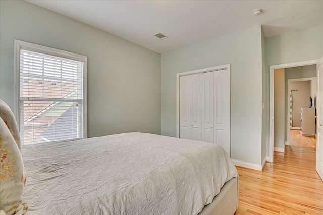 210 Oleander Trl, Evans, GA 30809 - bedroom featuring light wood-style flooring and a closet