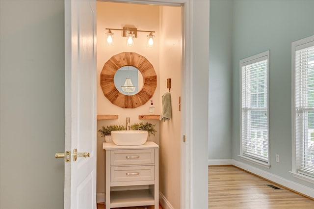 210 Oleander Trl, Evans, GA 30809 - bathroom featuring vanity and wood finished floors