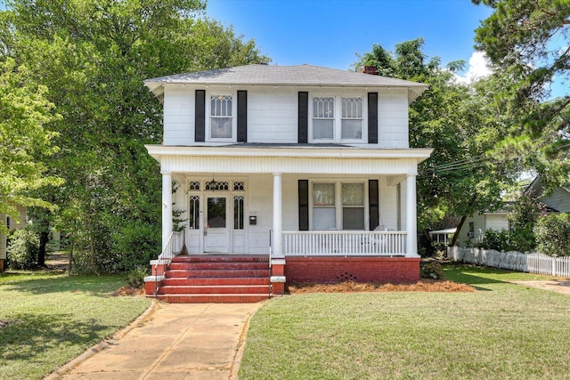 view of front of home featuring a front lawn