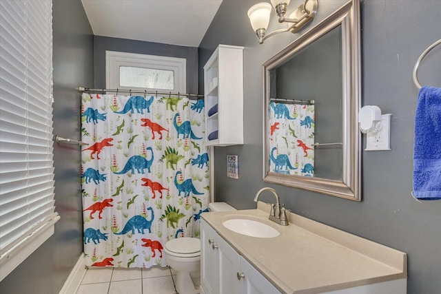 bathroom featuring tile patterned floors, vanity, toilet, and a shower with shower curtain