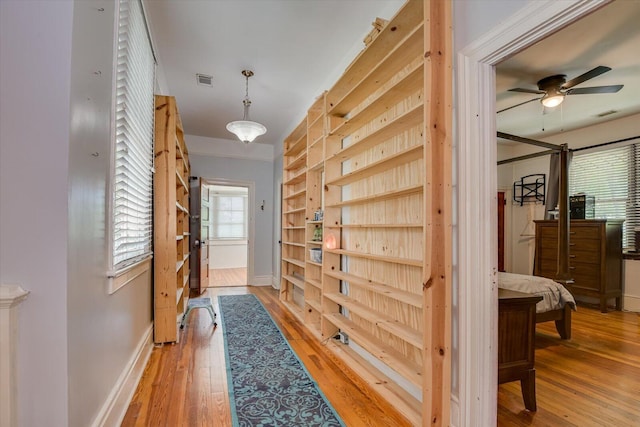 corridor featuring hardwood / wood-style flooring