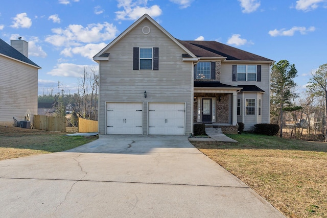 front of property featuring central AC unit, a garage, and a front yard