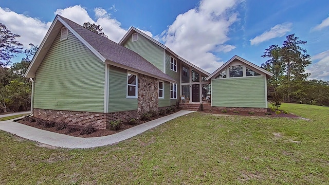 123 Coventry Cir, North Augusta, SC 29860 - rear view of property featuring a lawn and a shingled roof