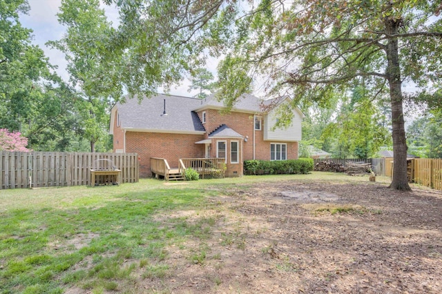 225 Old Mill Rd, Martinez, GA 30907 - back of property with brick siding, a fenced backyard, and a deck