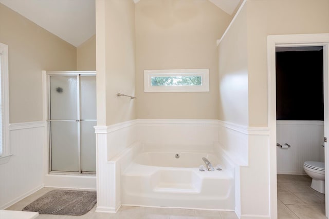 225 Old Mill Rd, Martinez, GA 30907 - full bathroom featuring vaulted ceiling, wainscoting, a garden tub, a stall shower, and tile patterned flooring