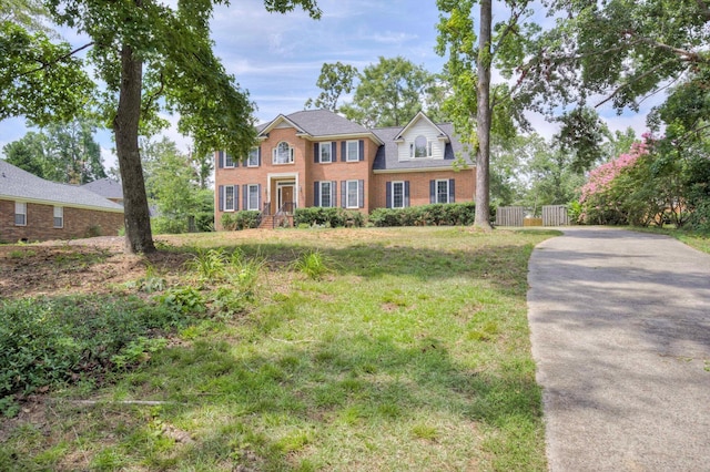 225 Old Mill Rd, Martinez, GA 30907 - colonial home featuring brick siding and a gate