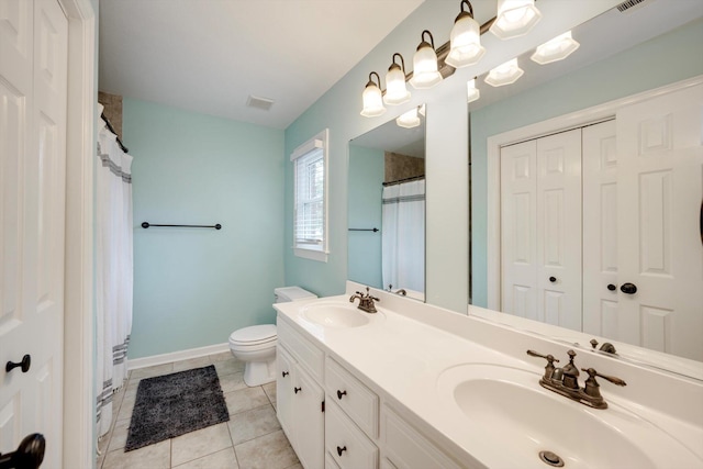 225 Old Mill Rd, Martinez, GA 30907 - bathroom featuring double vanity, tile patterned flooring, a closet, and a shower with shower curtain