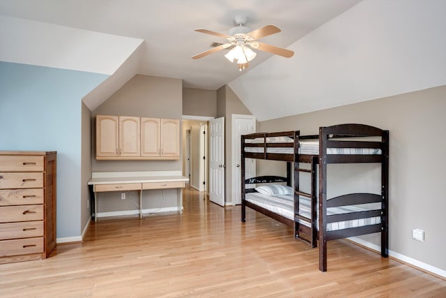 225 Old Mill Rd, Martinez, GA 30907 - unfurnished bedroom featuring light wood finished floors, vaulted ceiling, and ceiling fan