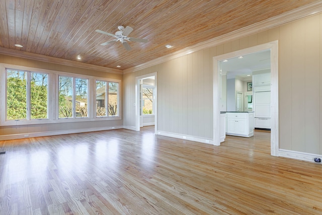 interior space featuring light wood-type flooring, ornamental molding, wooden ceiling, and a healthy amount of sunlight