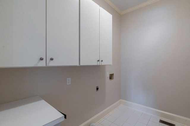 washroom with cabinet space, visible vents, ornamental molding, hookup for a washing machine, and electric dryer hookup