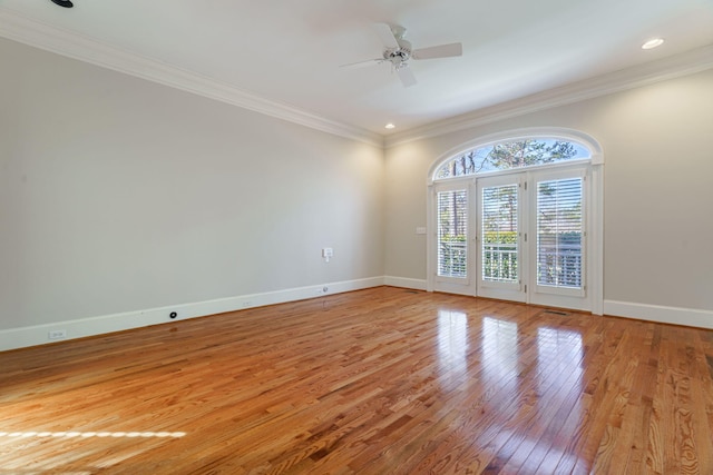 unfurnished room with baseboards, a ceiling fan, light wood-style flooring, ornamental molding, and recessed lighting