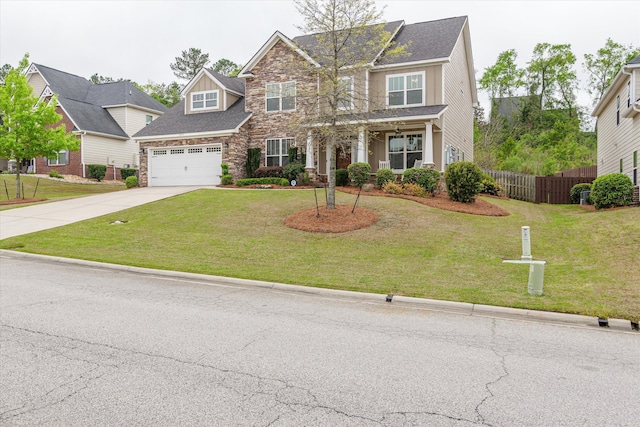 322 Pump House Rd, Evans, GA 30809 - craftsman-style house featuring a front yard, fence, stone siding, and concrete driveway