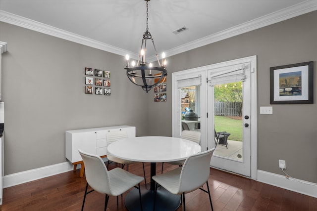 322 Pump House Rd, Evans, GA 30809 - dining space with crown molding, dark wood-style flooring, baseboards, and visible vents