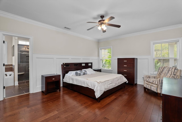322 Pump House Rd, Evans, GA 30809 - bedroom featuring crown molding, a decorative wall, dark wood-style flooring, and visible vents