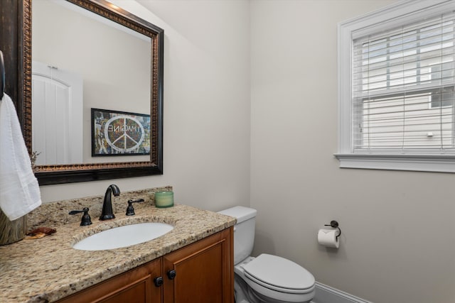 322 Pump House Rd, Evans, GA 30809 - bathroom with vanity, baseboards, and toilet