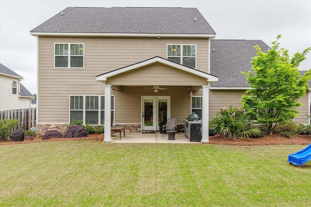 322 Pump House Rd, Evans, GA 30809 - rear view of house with a ceiling fan, a lawn, a patio, fence, and a shingled roof