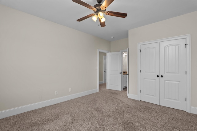 322 Pump House Rd, Evans, GA 30809 - unfurnished bedroom with a closet, baseboards, ceiling fan, and carpet