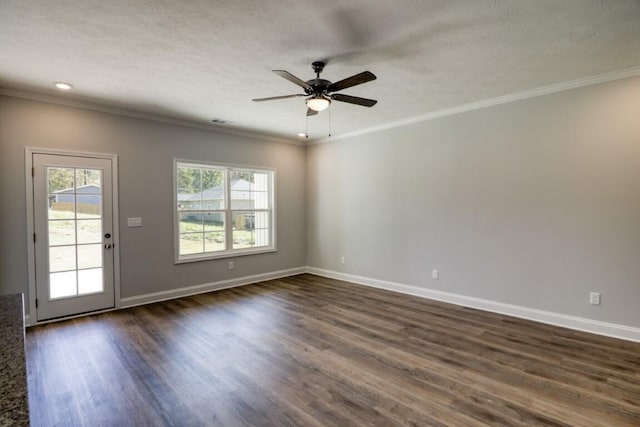 unfurnished room with ceiling fan, dark hardwood / wood-style flooring, ornamental molding, and a textured ceiling