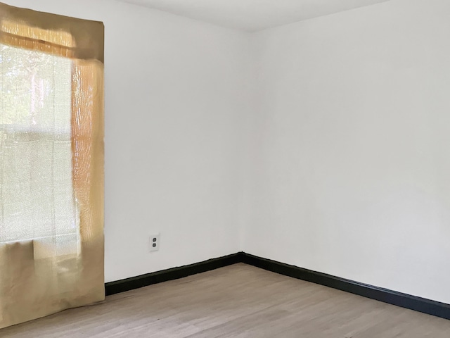 599 Twin Oaks Rd, Thomson, GA 30824 - spare room with wood finished floors