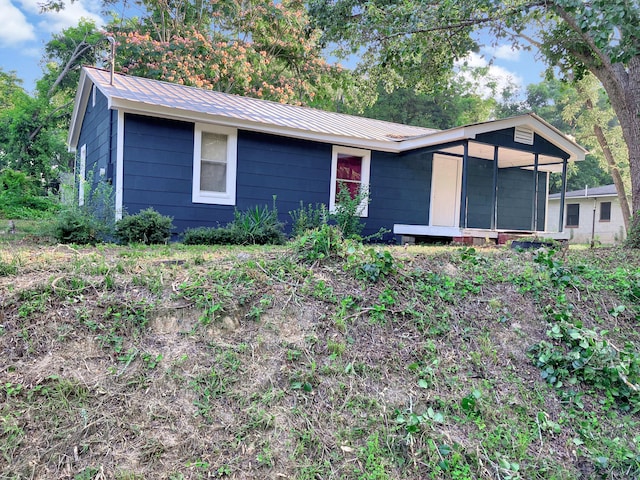 599 Twin Oaks Rd, Thomson, GA 30824 - single story home with a metal roof