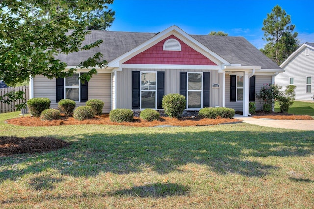 view of front of home with a front yard