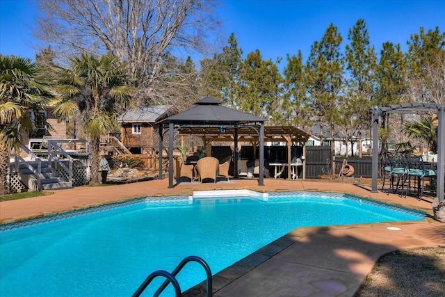 view of pool featuring a pergola and a gazebo