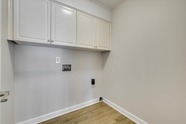 4142 Quinn Dr, Evans, GA 30809 - laundry area featuring cabinet space, washer hookup, light wood-style floors, and hookup for an electric dryer