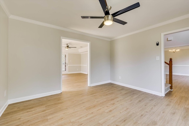 4142 Quinn Dr, Evans, GA 30809 - empty room with ornamental molding, ceiling fan, light wood finished floors, stairs, and a chandelier
