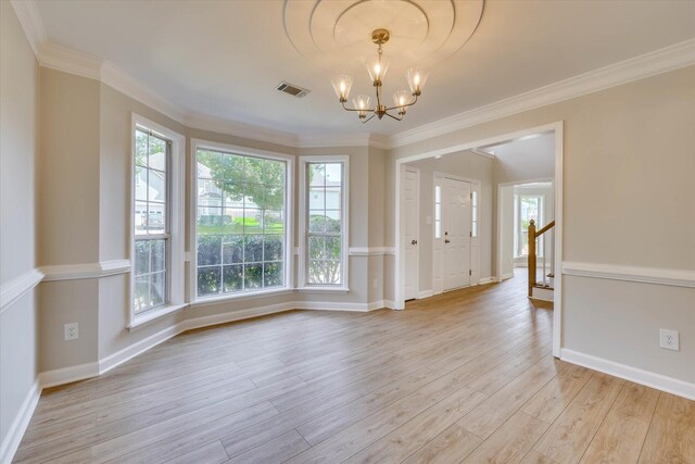 4142 Quinn Dr, Evans, GA 30809 - spare room featuring a chandelier, light wood-type flooring, and ornamental molding