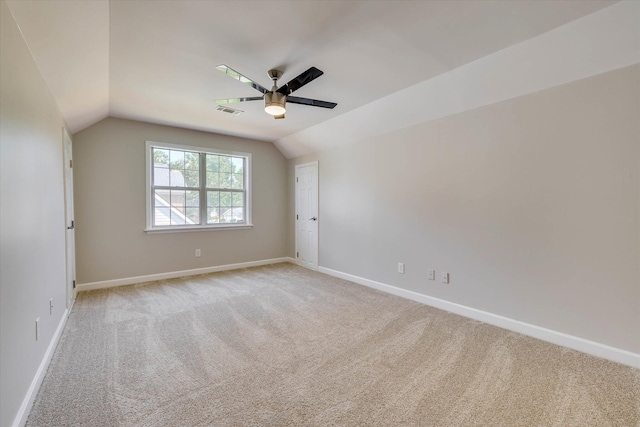4142 Quinn Dr, Evans, GA 30809 - unfurnished room featuring a ceiling fan, light colored carpet, and vaulted ceiling