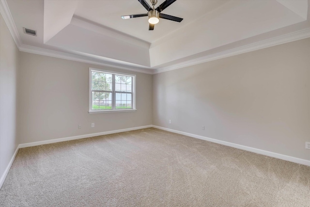 4142 Quinn Dr, Evans, GA 30809 - empty room featuring a raised ceiling, carpet, ornamental molding, and a ceiling fan
