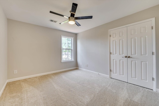 4142 Quinn Dr, Evans, GA 30809 - unfurnished bedroom with carpet flooring, a closet, and ceiling fan