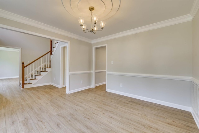 4142 Quinn Dr, Evans, GA 30809 - spare room with stairway, a chandelier, crown molding, and wood finished floors