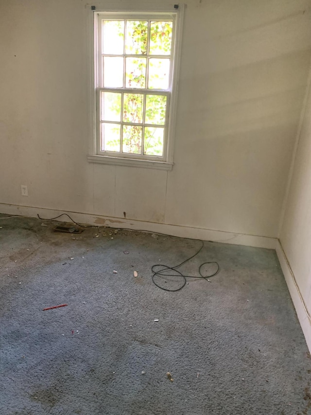 1555 Koger St, Augusta, GA 30904 - spare room featuring carpet and baseboards