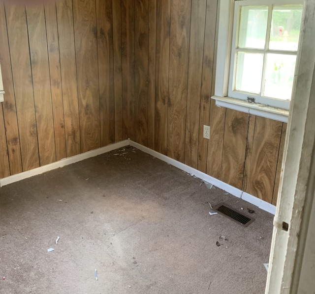 1555 Koger St, Augusta, GA 30904 - empty room with baseboards and wood walls