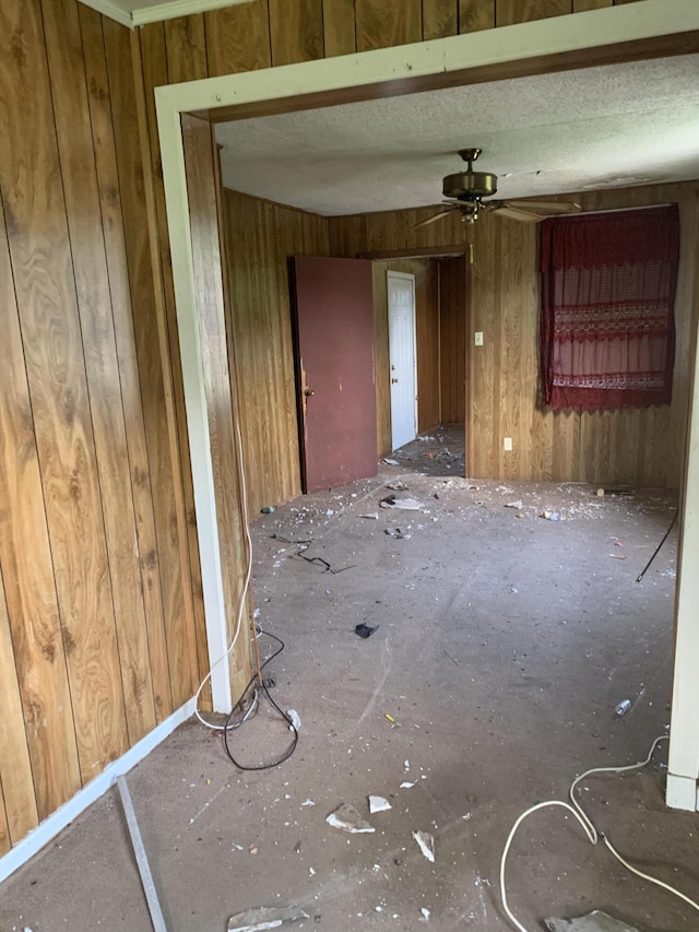 1555 Koger St, Augusta, GA 30904 - unfurnished room featuring ceiling fan and wood walls