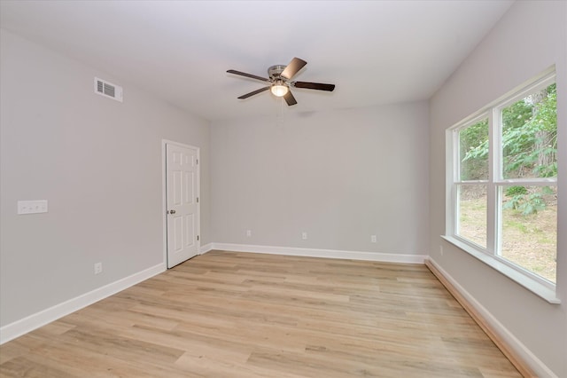 2815 Ridge Crest Dr, Hephzibah, GA 30815 - empty room featuring a ceiling fan, light wood-style floors, and baseboards