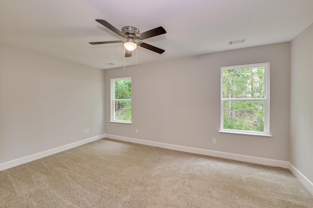 2815 Ridge Crest Dr, Hephzibah, GA 30815 - spare room with baseboards, carpet floors, and a ceiling fan