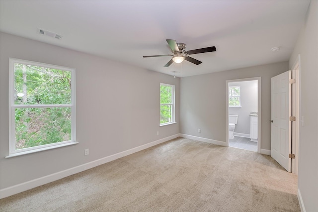 2815 Ridge Crest Dr, Hephzibah, GA 30815 - unfurnished room with baseboards, a ceiling fan, and light carpet