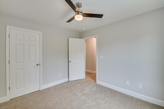 2815 Ridge Crest Dr, Hephzibah, GA 30815 - unfurnished bedroom featuring carpet, baseboards, and ceiling fan