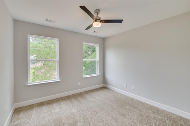 2815 Ridge Crest Dr, Hephzibah, GA 30815 - unfurnished room featuring baseboards, plenty of natural light, and ceiling fan