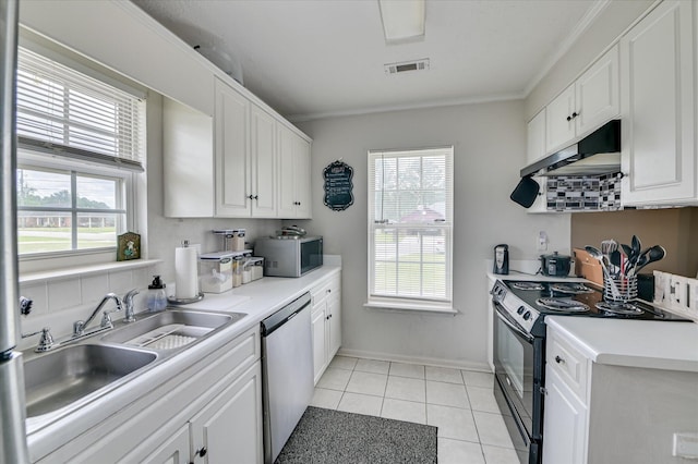 2211 Altman Way, Hephzibah, GA 30815 - kitchen featuring electric range, stainless steel dishwasher, under cabinet range hood, plenty of natural light, and crown molding