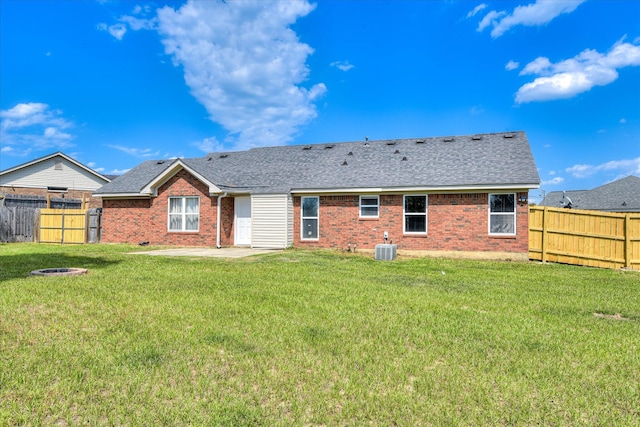 3643 Stanton Ct, Augusta, GA 30906 - rear view of house with brick siding, an outdoor fire pit, a shingled roof, cooling unit, and a patio