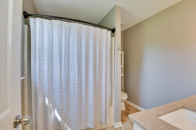 3643 Stanton Ct, Augusta, GA 30906 - full bath with vanity, toilet, shower / bath combination with curtain, and baseboards