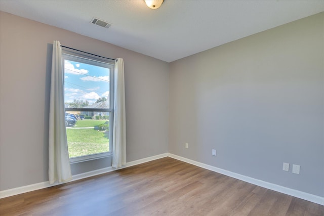 3643 Stanton Ct, Augusta, GA 30906 - unfurnished room featuring wood finished floors, healthy amount of natural light, and baseboards