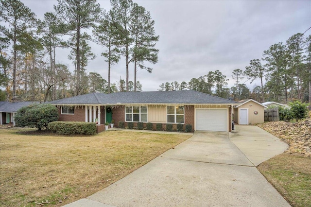 ranch-style house with a front lawn and a garage