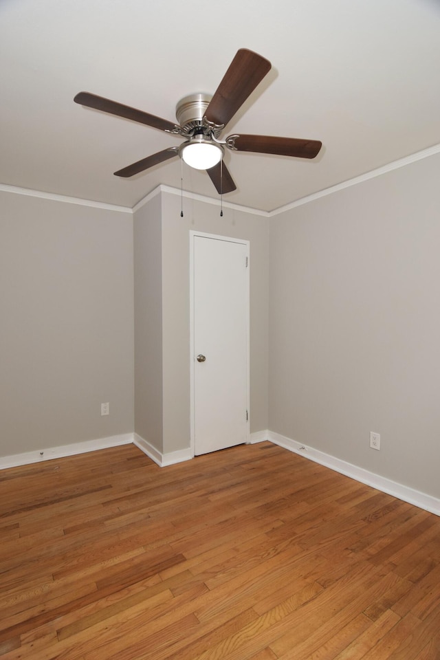 2320 Henry Cir, Augusta, GA 30906 - spare room featuring ornamental molding, a ceiling fan, light wood-style floors, and baseboards
