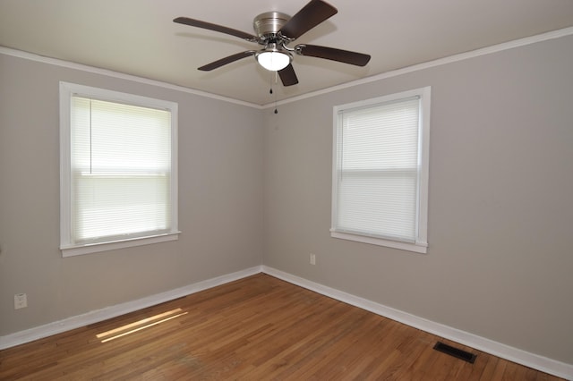 2320 Henry Cir, Augusta, GA 30906 - unfurnished room featuring baseboards, crown molding, wood finished floors, and ceiling fan